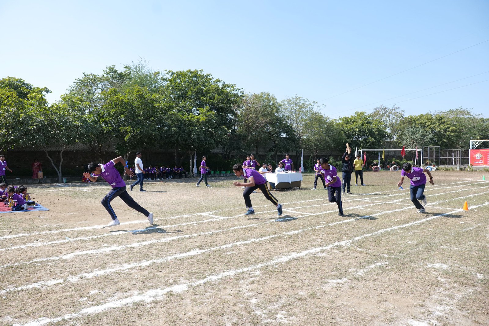 As the torch illuminated the track, the classes eagerly lined up for the commencement of the races. 