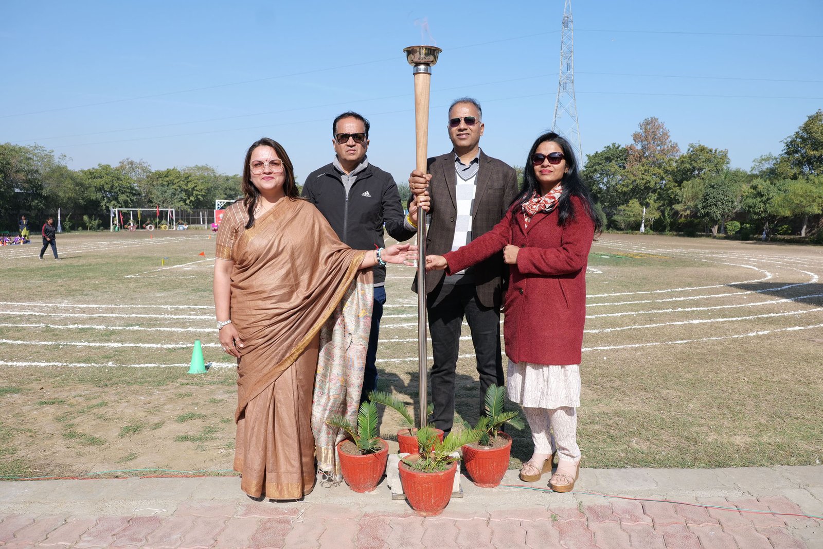 The-Sports-Day-program-started-with-the-torch-holding-ceremony.-Then-the-race-for-classes-began-Igniting-Passion-and-Unity-Unveiling-the-Spectacle-of-Our-Schools-Sports-Day